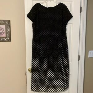 Size 22 mid-length dress with short sleeves.